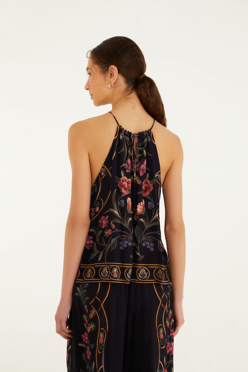 Vista trasera de la blusa floral Belle mostrando el estampado y el diseño.