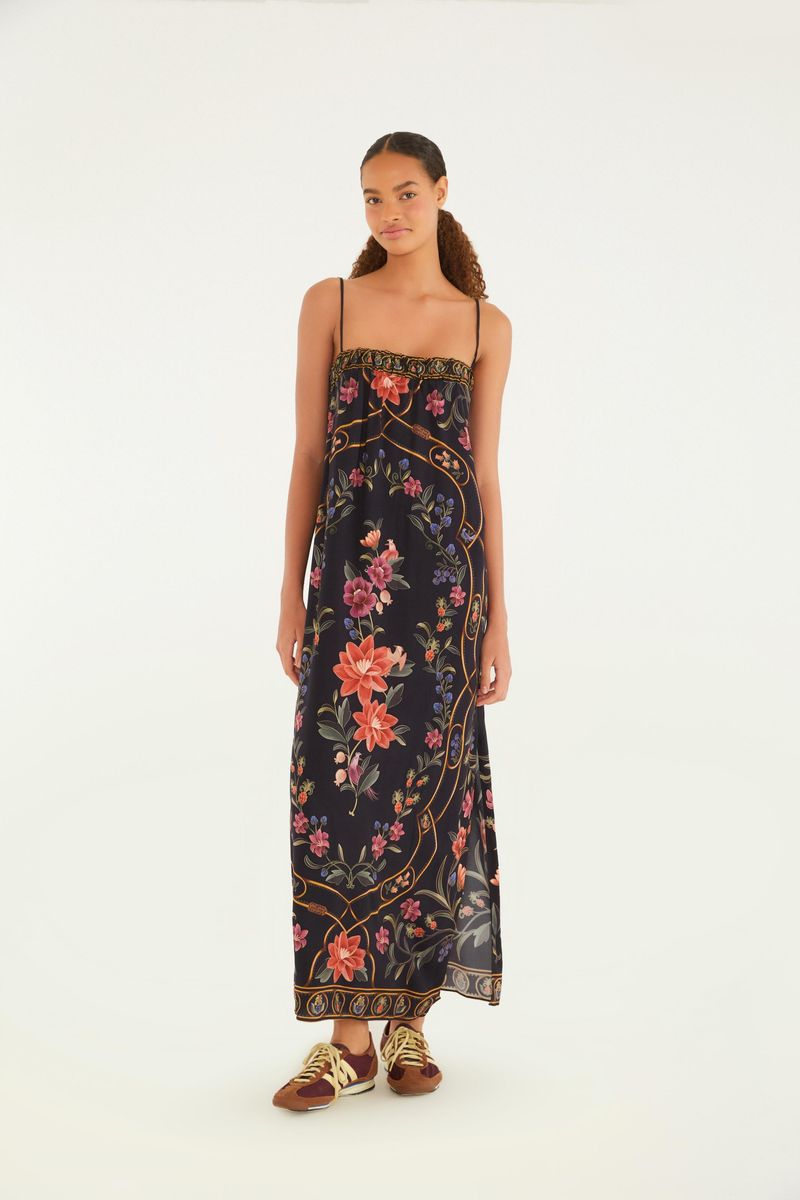 Imagen de un vestido cropped floral Belle visto de frente, con tirantes delgados y estampado floral vibrante.