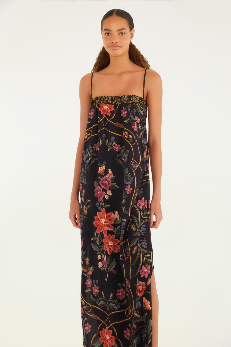 Imagen de un vestido cropped floral Belle visto desde atrás, destacando el diseño de los tirantes y el estampado floral.