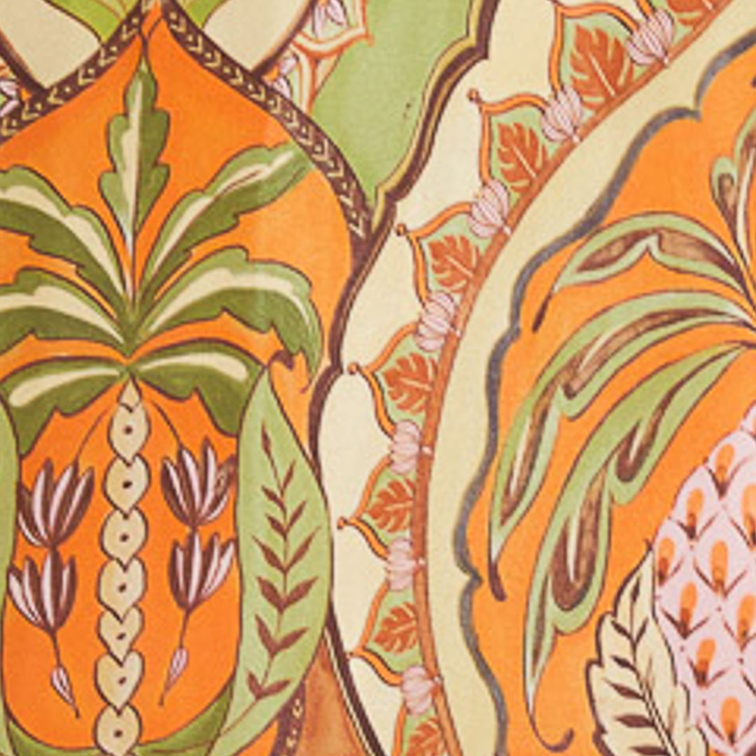 Imagen mostrando el estampado tropical de la Falda Pareo Odara con elementos botánicos y geométricos en tonos cálidos.