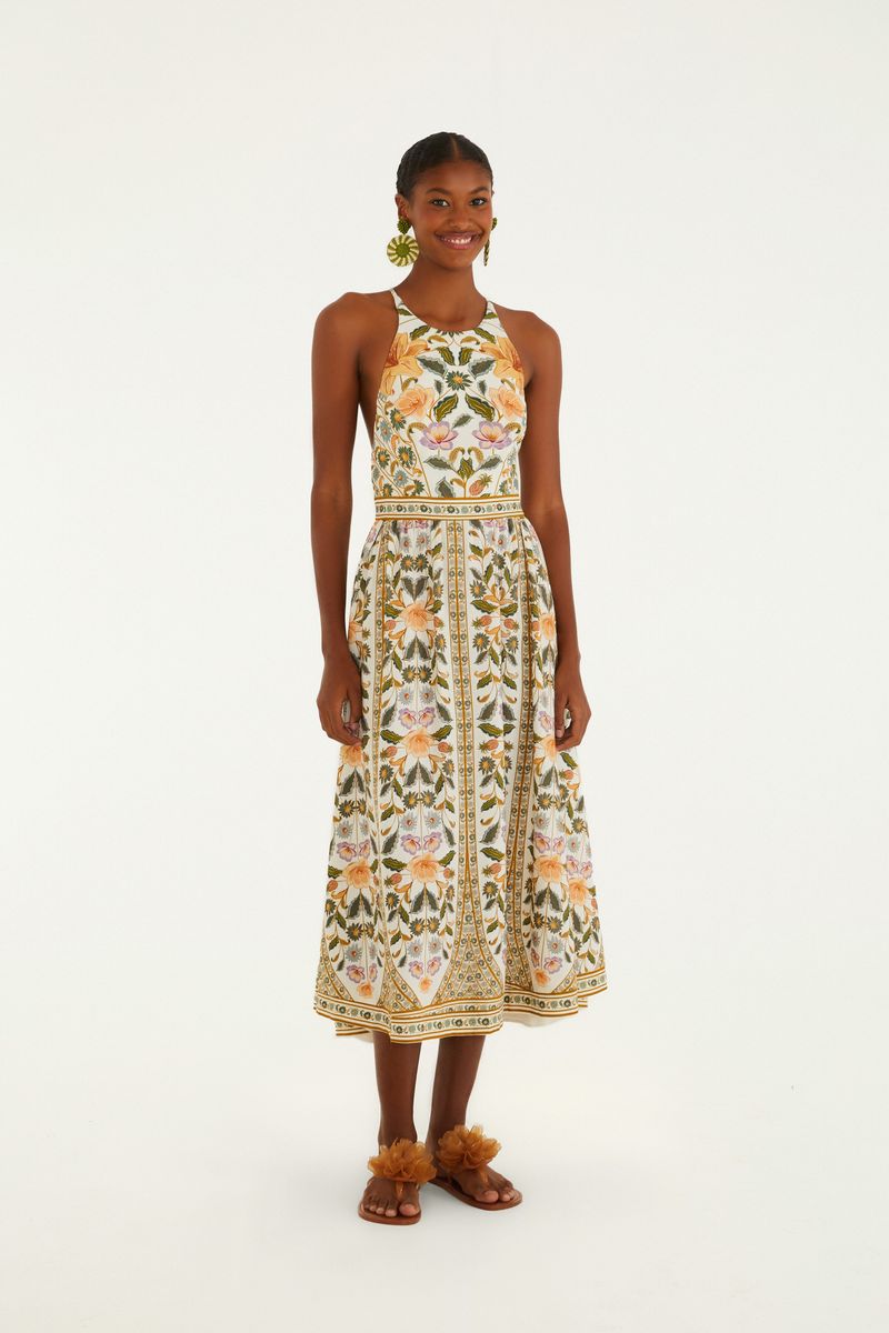 Vestido largo sin mangas con estampado floral en tonos vibrantes, visto de frente.