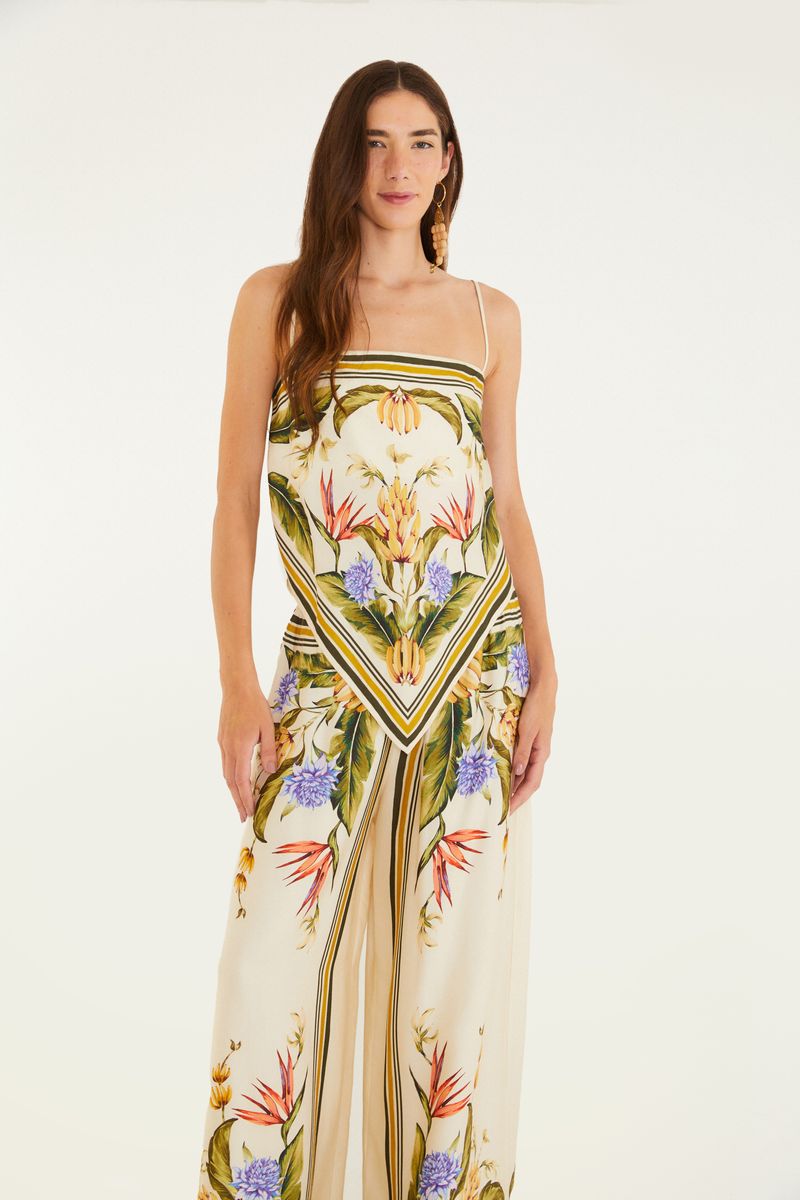 Vista frontal de la calza estampada tropical con diseño floral y estilo pantalón amplio.