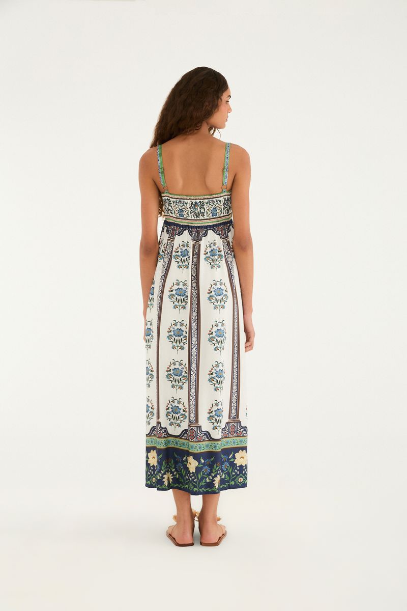 Imagen de un vestido cropped estampado con tirantes finos, mostrando detalles del corpiño.