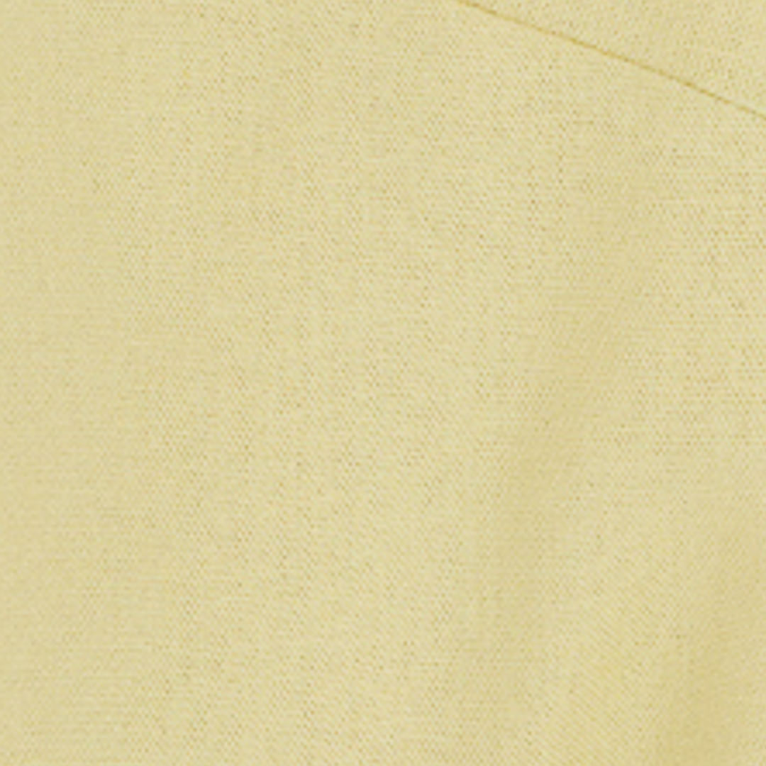 Primer plano de la tela amarilla sólida de la regata.