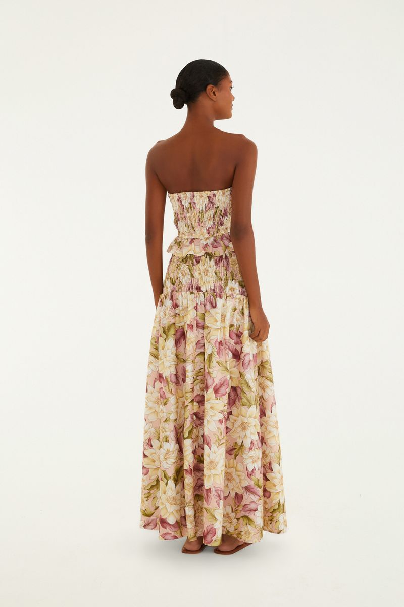 Detalle del estampado floral de la Falda Serena, con flores en tonos de rosa, amarillo y verde.