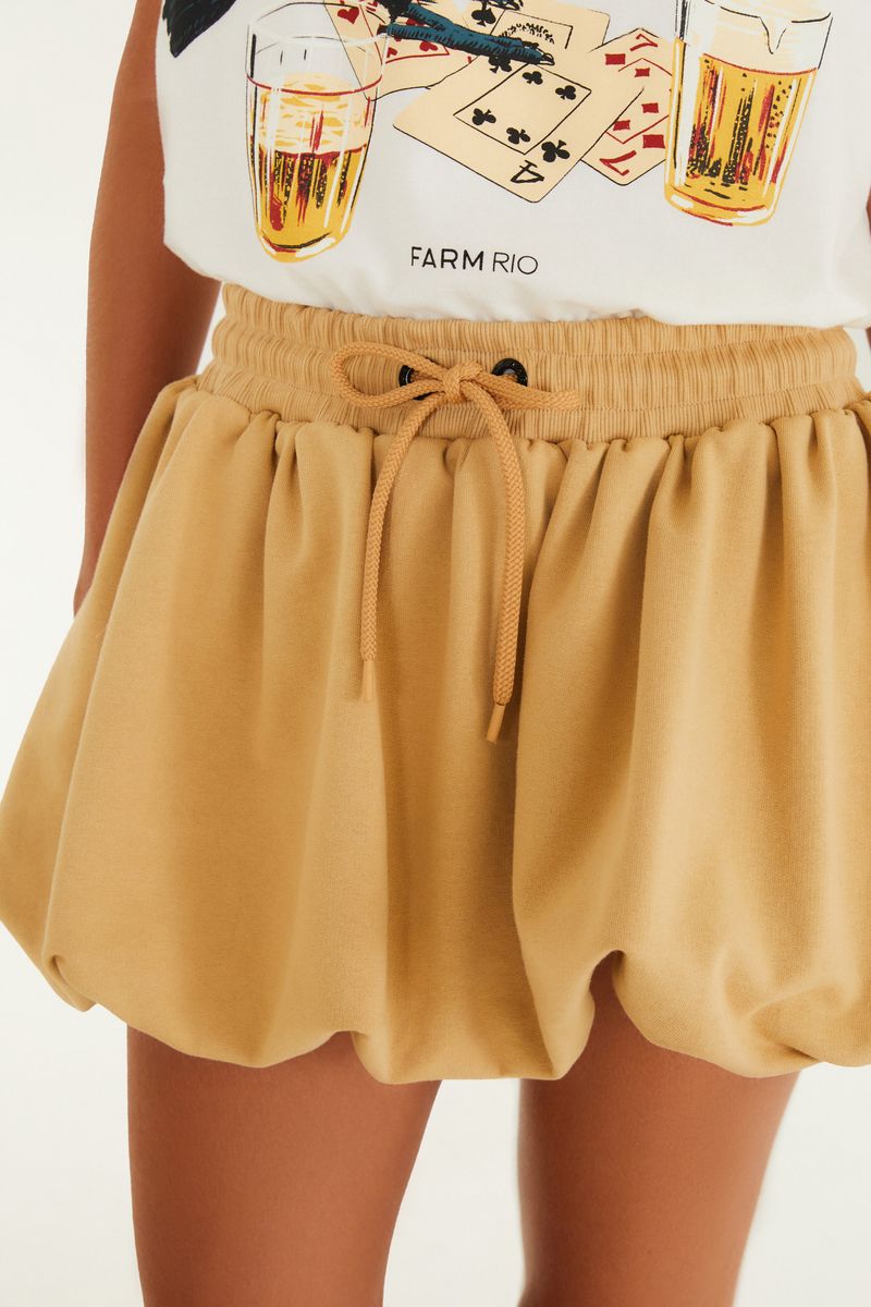 Primer plano de la cintura de la Falda Balón Sudadera, destacando el ajuste por lazada.