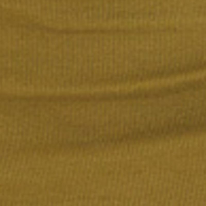 Detalle de la tela verde del vestido con textura acanalada.