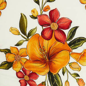 Acercamiento al estampado floral vibrante del vestido midi, mostrando detalles de flores y hojas.