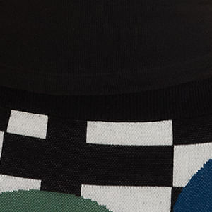 Detalle del tejido de la Camiseta sin mangas Nina Bicolor, destacando su calidad y textura.